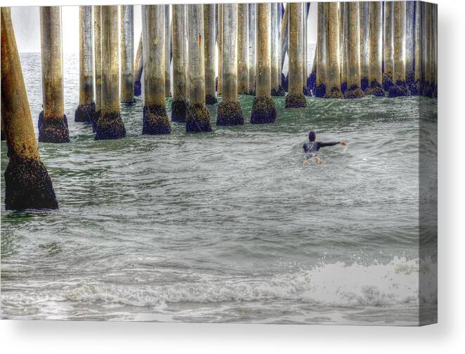 Huntington Pier Canvas Print featuring the photograph Paddling Out by Richard Omura