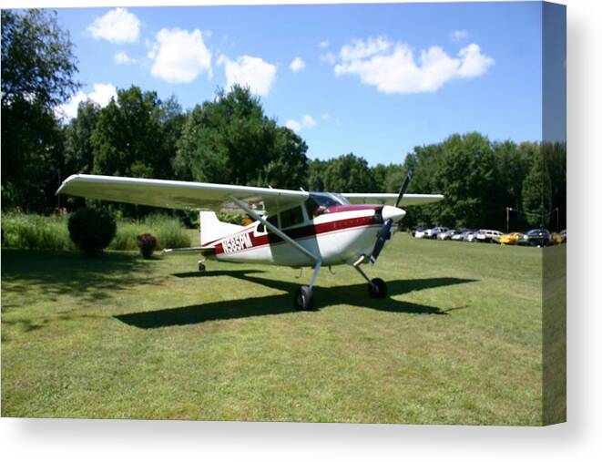 Airplane Canvas Print featuring the photograph Parked Aircraft At Fly In by Vincent Duis