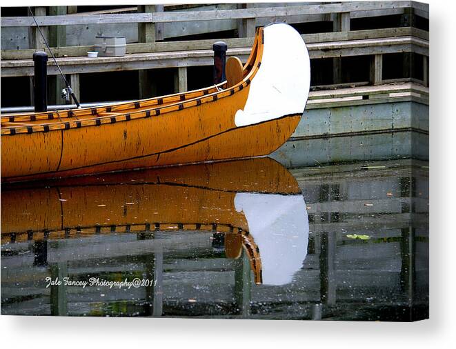 Photography Canvas Print featuring the photograph Reflection of a Canoe by Jale Fancey