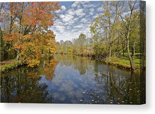 Autumn Canvas Print featuring the photograph Reflections on the Canal by David Letts