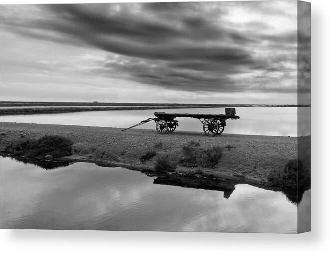 Photography Photographs Canvas Print featuring the photograph Sky low old chariot by Philippe Taka