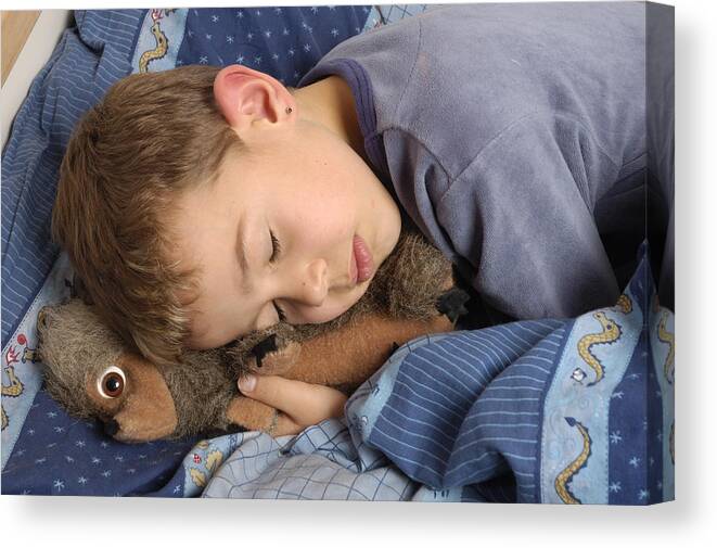 Sleeping Canvas Print featuring the photograph Sleeping child by Matthias Hauser