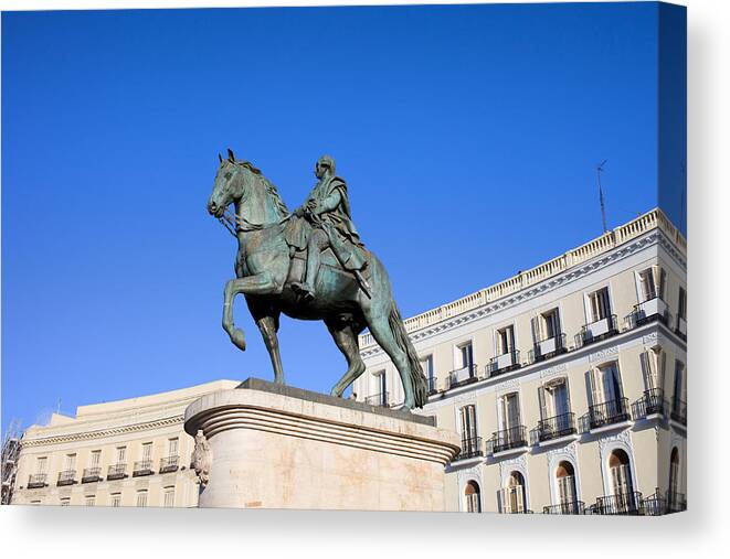 Monument Canvas Print featuring the photograph Statue of King Charles III in Madrid by Artur Bogacki