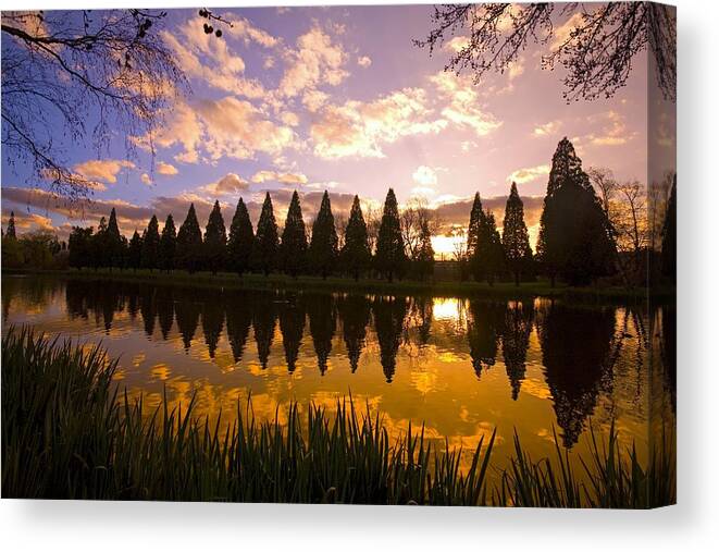American Canvas Print featuring the photograph Sunset Reflection In A Park Pond by Craig Tuttle