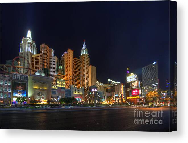 Art Canvas Print featuring the photograph The Strip by Yhun Suarez