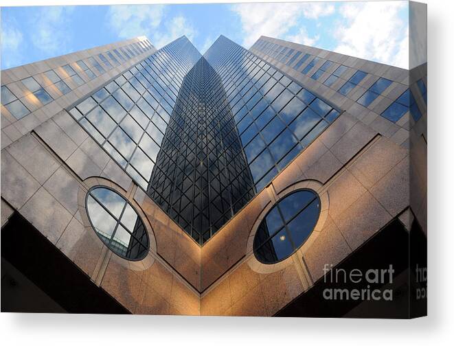 Urban Canvas Print featuring the photograph Towering Modern Skyscraper in Downtown by Gary Whitton