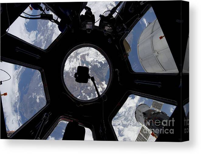 Space Station Canvas Print featuring the photograph View Of Earth Through The Cupola by Stocktrek Images