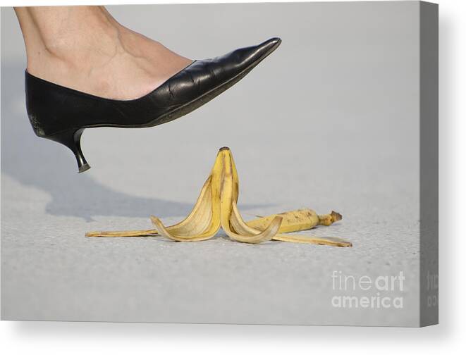 Banana Peel Canvas Print featuring the photograph Walking on banana peel by Mats Silvan