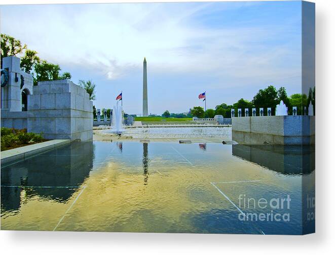 Ww Ii Memorial Canvas Print featuring the photograph Washington Monument and the World War II Memorial by Jim Moore