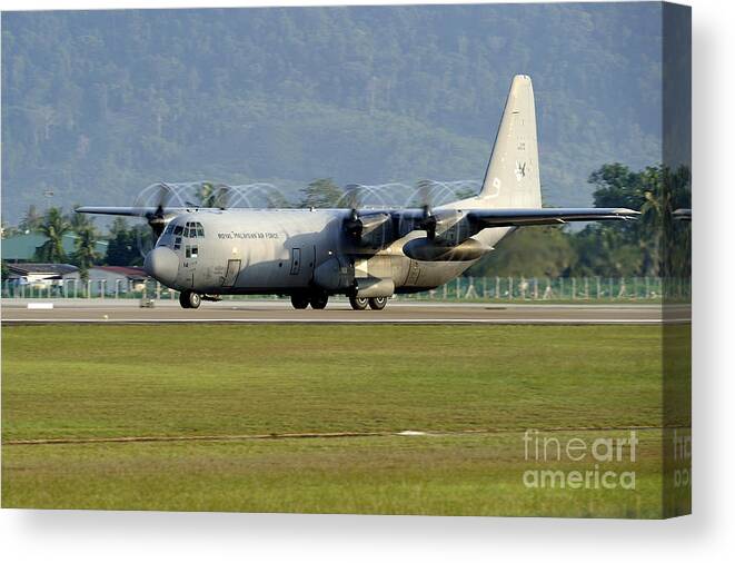 Horizontal Canvas Print featuring the photograph A C-130j Hercules Of The Royal #1 by Remo Guidi