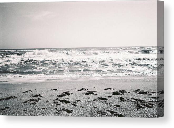 Sand Canvas Print featuring the photograph Footprints In Sand #1 by Cat Rondeau