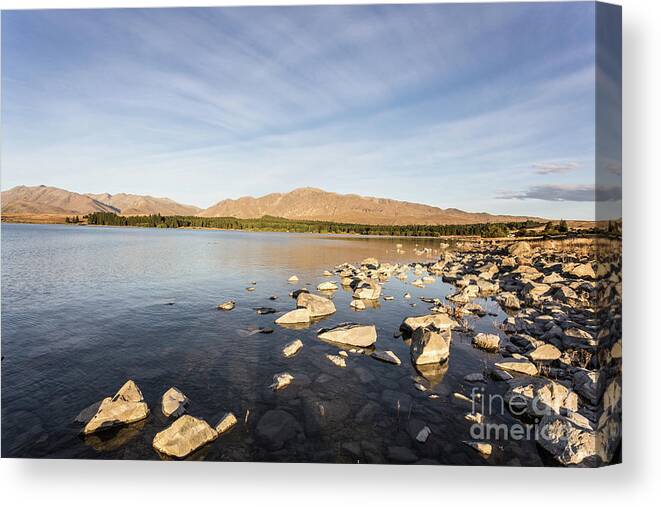 New Zealand Canvas Print featuring the photograph lake Tekapo on a late summer afternoon in New Zealand #1 by Didier Marti