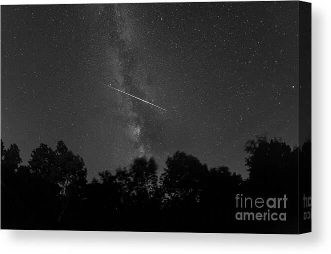 Meteoroid Canvas Print featuring the photograph Meteoroid Milky Way Crossing #1 by Michael Ver Sprill