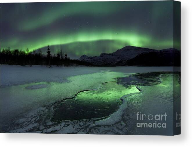 Green Canvas Print featuring the photograph Reflected Aurora Over A Frozen Laksa #1 by Arild Heitmann