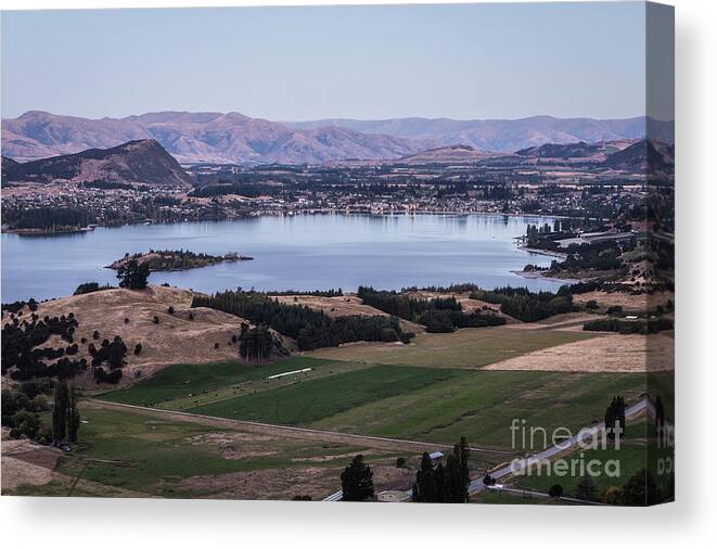 High Angle View Canvas Print featuring the photograph Sunset over Lake Wanaka in New Zealand #1 by Didier Marti
