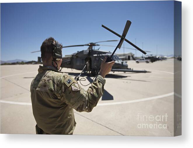 Exercise Angel Thunder Canvas Print featuring the photograph Pararescuemen Conducts A Communications #10 by Terry Moore