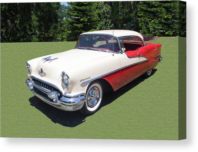 Antique Car Canvas Print featuring the photograph 1955 Oldsmobile Super 88 Holiday by Carlos Diaz
