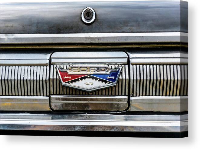 1960 Canvas Print featuring the photograph 1960 Ford Falcon trunk lid emblem by Jim Hughes