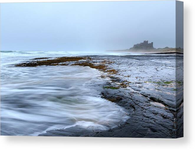 Ancient Canvas Print featuring the photograph Bamburgh castle - #2 by Chris Smith