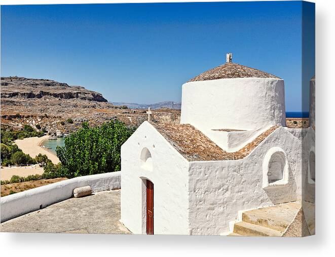 Chapel Canvas Print featuring the photograph A chapel in the village of Lindos in Rhodes - Greece. by Constantinos Iliopoulos