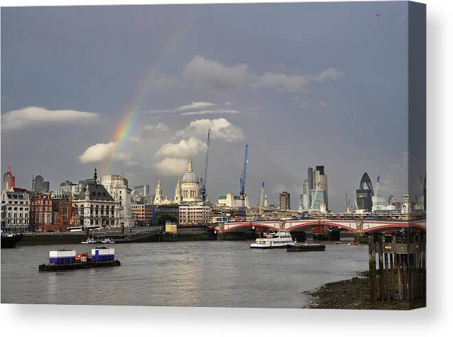 London Canvas Print featuring the photograph A rainbow over London by Dutourdumonde Photography