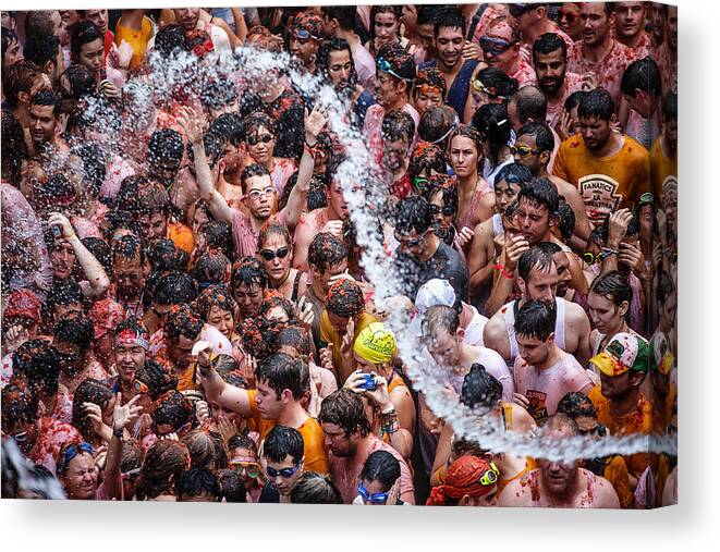 Water Canvas Print featuring the photograph A Shower In The Tomatina by Juan Luis Duran