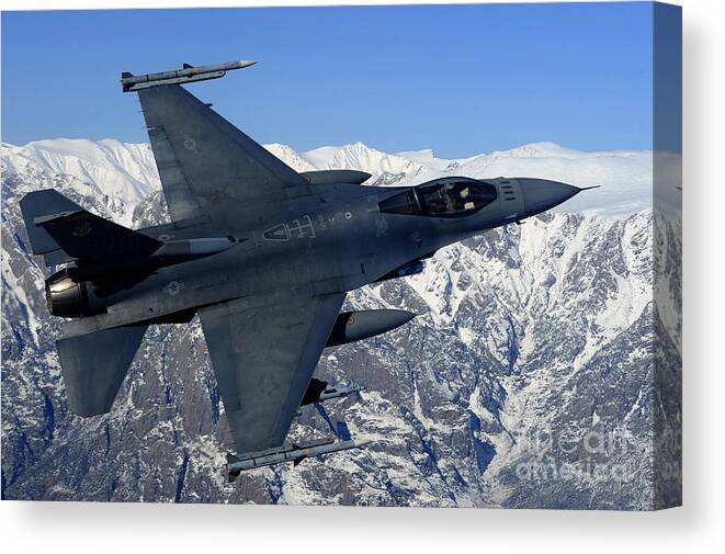 Afghanistan Canvas Print featuring the photograph A U.s. Air Force F-16 Fighting Falcon by Stocktrek Images