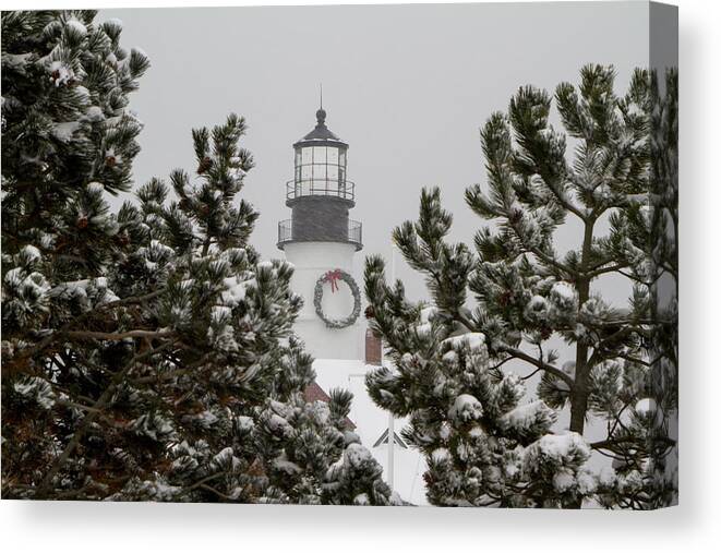 Snow Canvas Print featuring the photograph A View of the Portland Head Light by Darryl Hendricks