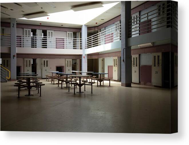 America Canvas Print featuring the photograph Abandoned jail common room in cell block by Karen Foley