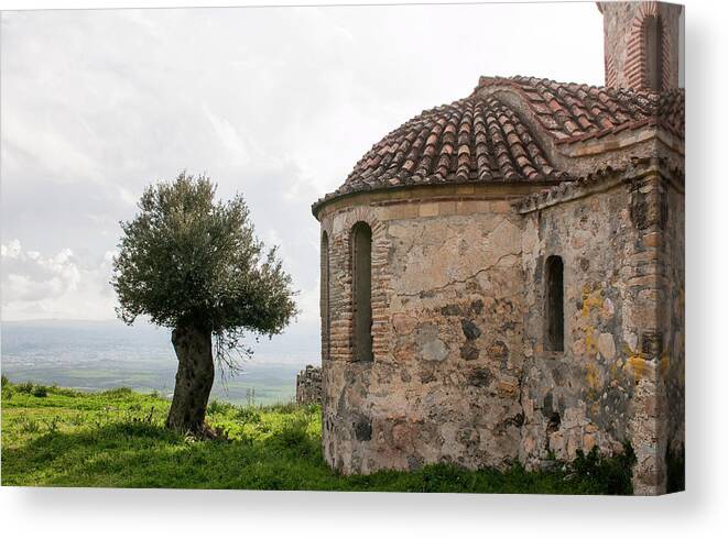 Ancient Chapel Canvas Print featuring the photograph Abandoned old orthodox Christian church and olive tree by Michalakis Ppalis