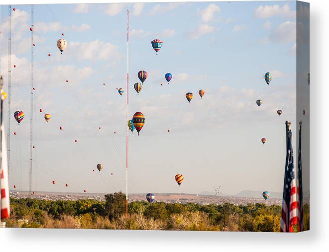Hot Air Balloons Canvas Print featuring the photograph The Great Accent by Charles McCleanon