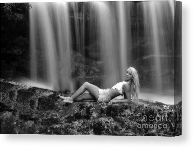 Waterfall Canvas Print featuring the photograph Ally laying down in front of waterfall by Dan Friend