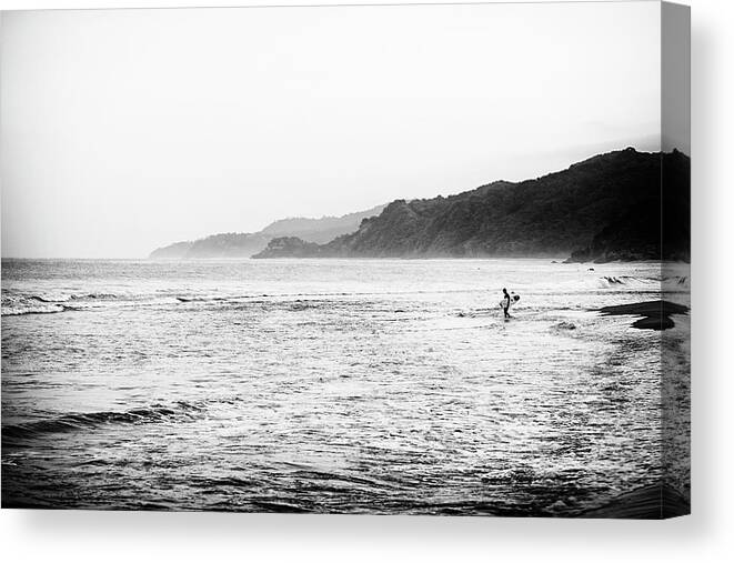 Surfing Canvas Print featuring the photograph Ambitious by Nik West