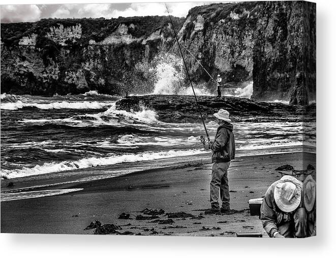  Canvas Print featuring the photograph Angler on the Beach by Patrick Boening