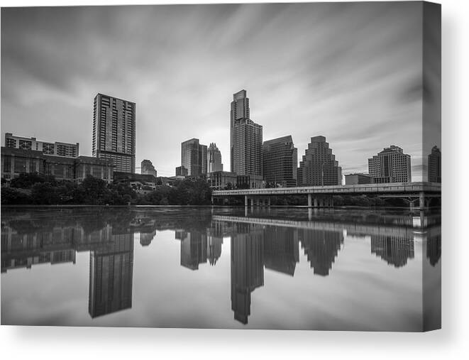 Austin Canvas Print featuring the photograph Austin Texas Skyline Reflecting in Ladybird Lake Long Exposure by Todd Aaron