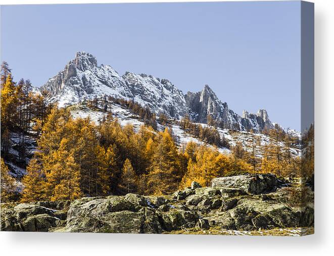 Mountain Landscape Canvas Print featuring the photograph Autumn in the French Alps by Paul MAURICE