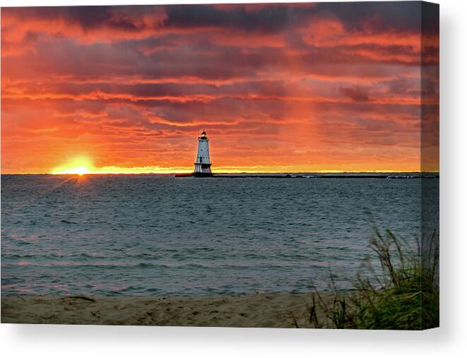 Ludington Mi Canvas Print featuring the photograph Awesome Sunset with Lighthouse by Lester Plank
