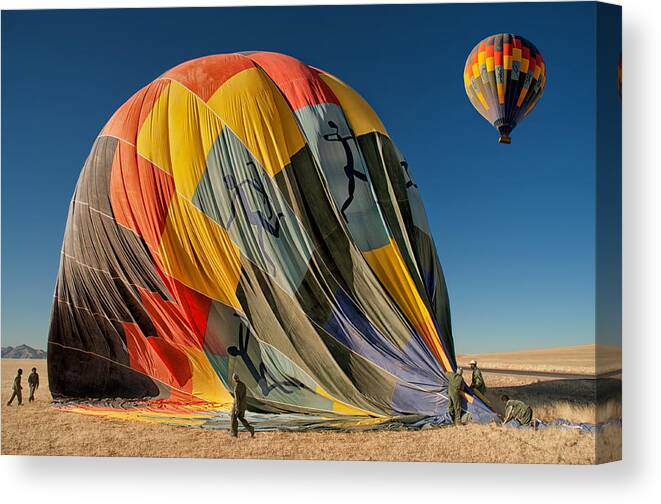 Balloon Canvas Print featuring the photograph Back On Earth by Mathilde Guillemot