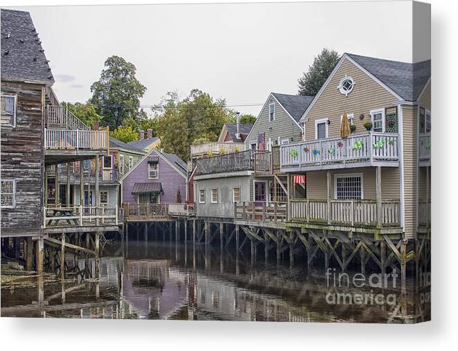 Back Canvas Print featuring the photograph Backside of wooden houses over water by Patricia Hofmeester
