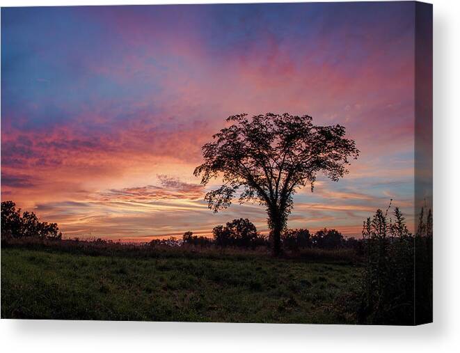 Sunset Canvas Print featuring the photograph Beauty After The Storm by Holden The Moment