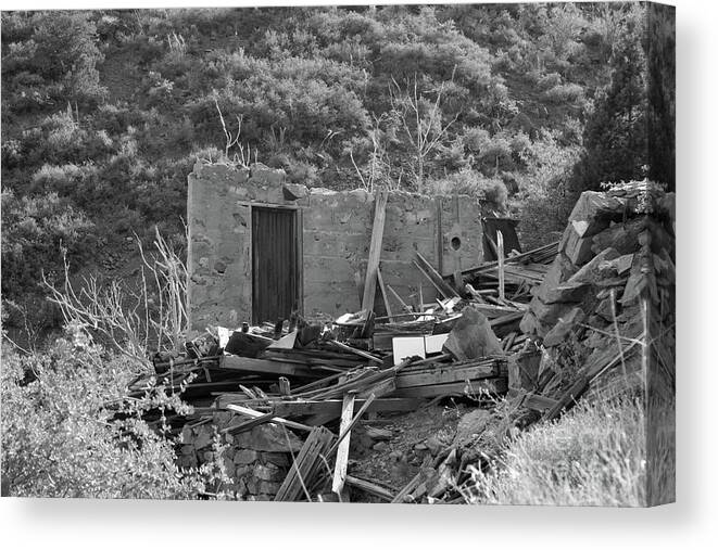 Black And White Canvas Print featuring the photograph Behind the Door by Kelly Holm