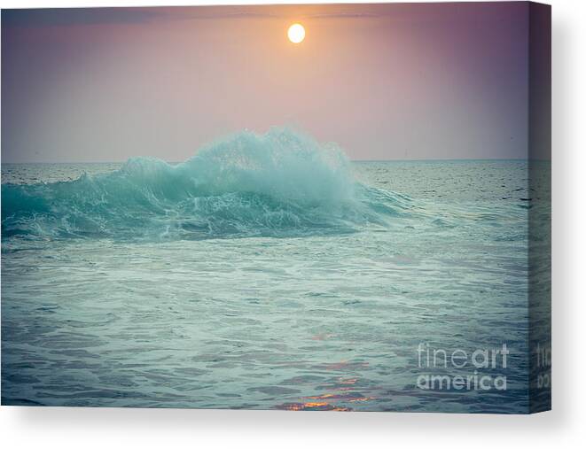 Water Canvas Print featuring the photograph Big ocean wave at sunset with sun by Raimond Klavins