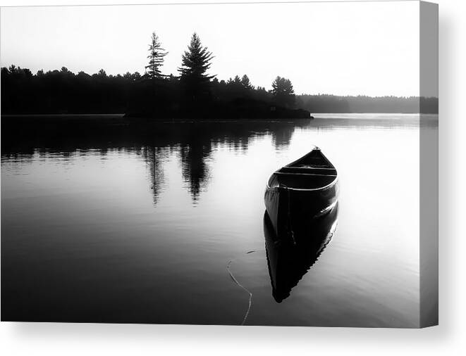 Canoe Canvas Print featuring the photograph Black And White Canoe In Still Water by Karl Anderson