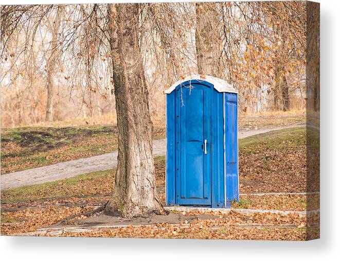 Autumn Canvas Print featuring the photograph Blue Chemical Toilet in the Park by Alain De Maximy