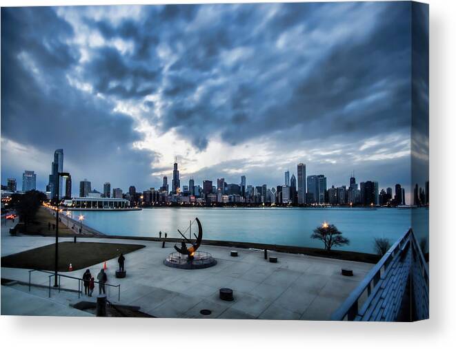 Chicago Canvas Print featuring the photograph Blue clouds and Chicago Skyline by Sven Brogren