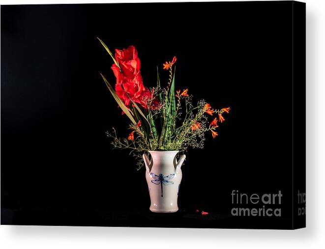 Bouguet In Red Canvas Print featuring the photograph Bouquet in red by Torbjorn Swenelius