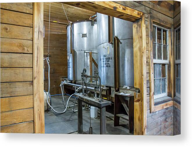 American Canvas Print featuring the photograph Bourbon distillery barrel filling room by Karen Foley