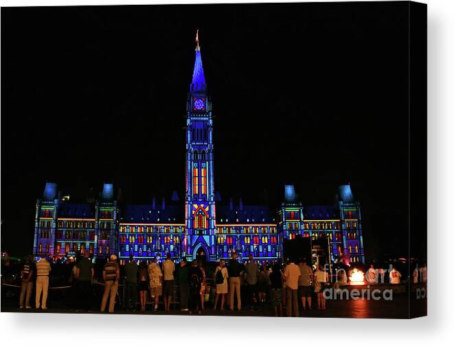 Ottawa Canvas Print featuring the photograph Canadian Parliament Light Show by Charline Xia