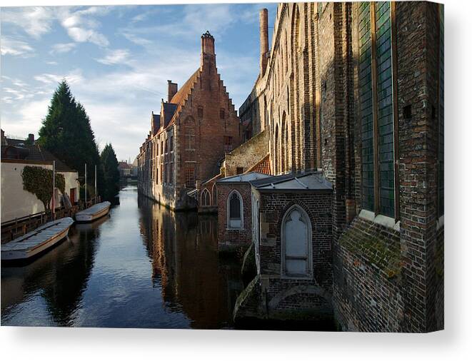 Lawrence Canvas Print featuring the photograph Canal By Church by Lawrence Boothby