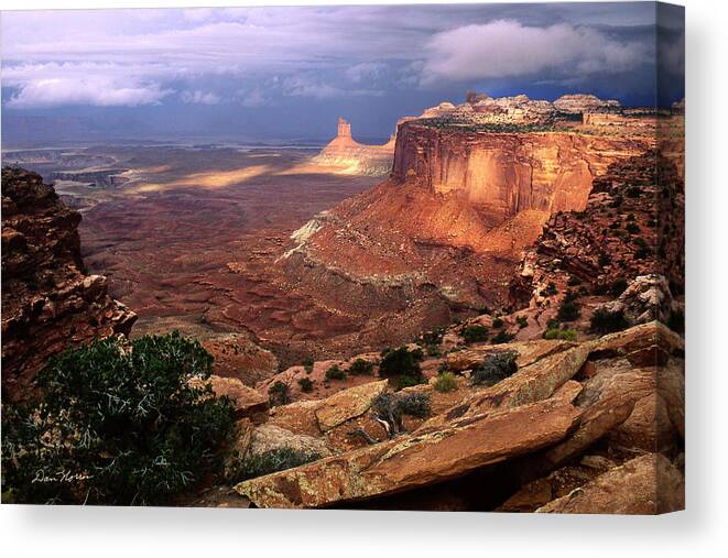 Canyonlands National Park Canvas Print featuring the photograph Candlestick Tower in Nature's Spotlight by Dan Norris